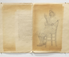 Pencil drawing of an elderly woman, sitting, looking at her phone, drawn on an open manila folder