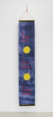 A hanging banner made of silk and organza that is blue, printed with wood-grain, with 2 yellow dots (1/3 from the bottom, 1/3 from the top. The words "to hang fruit / to hook leaves / to house seeds" are above and below the yellow dots