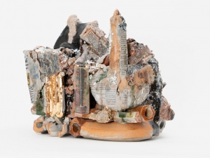 A sculpture of mixed glazes, lusters, and clay