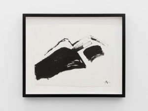 An abstract drawing of a mountain range, framed in black.