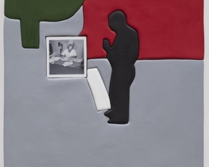 An artwork by Sadie Benning that is gray, red, and green. It depicts a figure's silhouette in black with a small square black and white photograph of a man at his desk with papers around it.