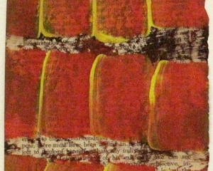 Red and yellow paint applied to a page of text from a book