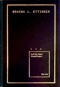 A photograph of the front cover of "And My Heart Wound-Space," which is a black ground with gold text