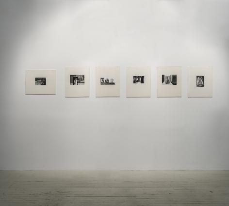 6 Hervé Guibert black and white photographs on cream mattes in a straight line on a single wall.