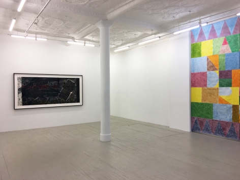 Installation view of Kahlil Robert Irving's collograph print and a portion of Colter Jacobsen's artwork