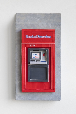A Bank of America exterior ATM sculpted out of foam and paper, installed on the wall. The ATM itself is depicted on a gray stone wall.